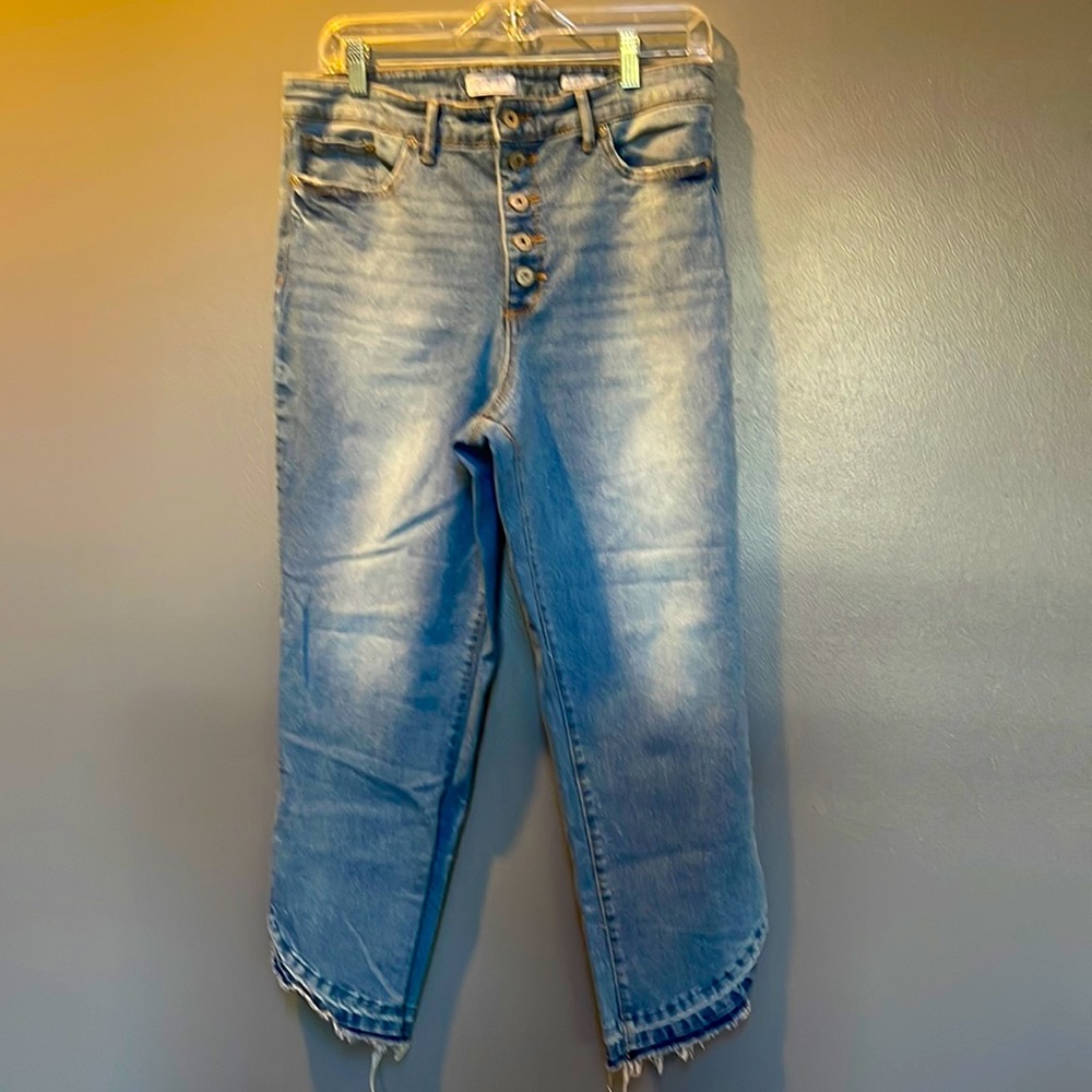 Light wash slim straight cropped jeans with button fly.